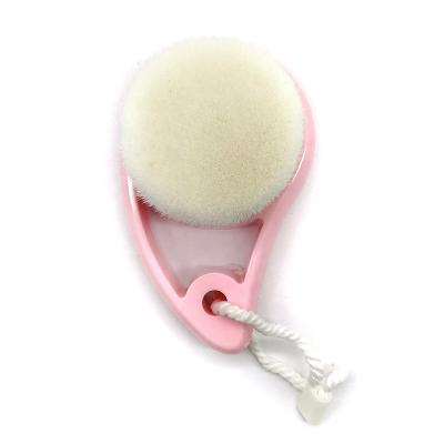 China Pink Pigment Removal Comma Shaped Face Cleansing Brush Waterproof Exfoliate Facial Cleansing Brush for sale