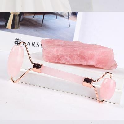 China Crystal Natural Rose Quartz Jade Massager Premium Jade Roller Facial Stone Face Roller Jade Cellulite Reduction Roller for sale