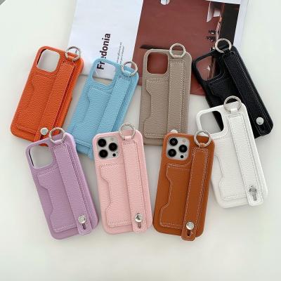 China Retro Shockproof Wristband Card Slot Phone Case High Quality Shockproof PC+Leather Bracket Design For iphone 13 13 pro max for sale