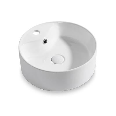 China XICI Eco-Friendly Hotel Above Counter Top Modern Art Basin White Color Basin Bathroom Sink Round Shape Ceramic for sale