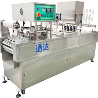 China Beverage Water Cup Filling Sealing Machine for sale