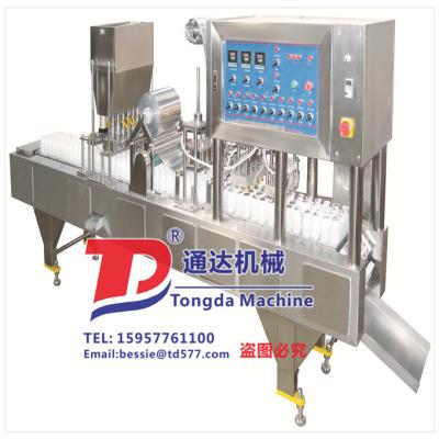 China APPAREL Milk Bottle Filling Sealing Machine , Factory Price Automatic Bottle Packing Machine for sale