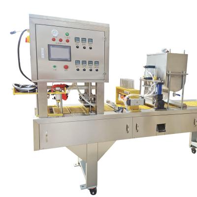 China Food Spoon Filling Sealing Machine Factory Producing Coating And Rotary Type Honey Spoon Filling Sealing Packing Machine for sale