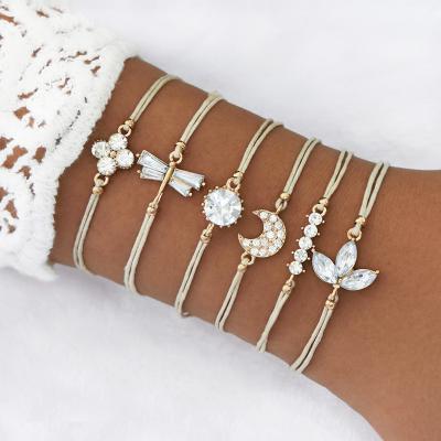 China New Gold Plated Hiphop Fashion White Diamond Clover Moom Women Jewelry Gift Round Cuff Tassels Bead Bracelet Set for sale