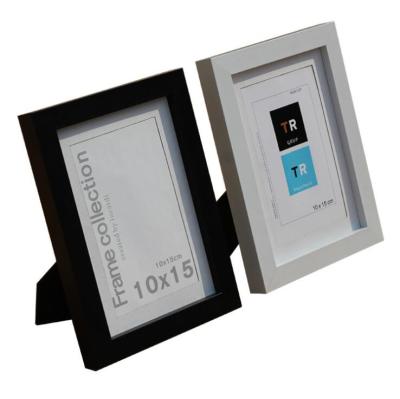 China Fashionable Photo Frame A5 Photo Frame Multi-Size Solid Wood PVC Picture Frame With Stand for sale