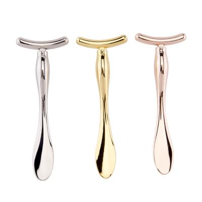 China Massage Eye Cream Metal Facial Massager Beauty Face Roller Eye Cream Spoon Mini Face Massage Roller Mask for sale