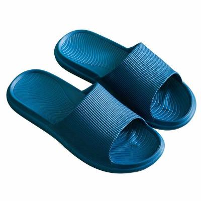 China New Eva Material Non Slip Indoor Ladies Slippers Durable Shock Absorption Men's Home Slippers for sale