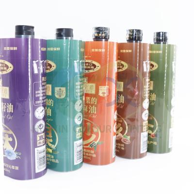 China Waterproof Custom PVC Juice Bottle Label Lable Plastic Shinking Heat Shrink Film Sleeve Printing For Bottle for sale