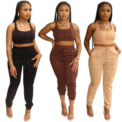 China QUICK DRY Trendy Girls Crop Top And Pants Teams Solid 2 Piece Sports Tank Workout Sleeveless Tracksuit Jogger Set Women for sale