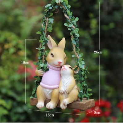 China Creative Pastoral Landscaping Europe Garden Swing Rabbit Tree Park Resin Handwork Outdoor Pendant Decorative Decoration Pendant for sale