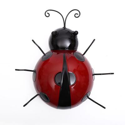 China Hot Selling Europe Amazon Iron Ladybug Wall Hanging Garden Ornament Kindergarten Decoration Insect Wall Decoration for sale