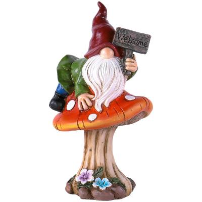 China World Outdoor Park Garden Decoration Resin Craft Ornament Holding White Beard Santa Claus Dwarf Welcome Sign Elf Faceless Sculpture for sale