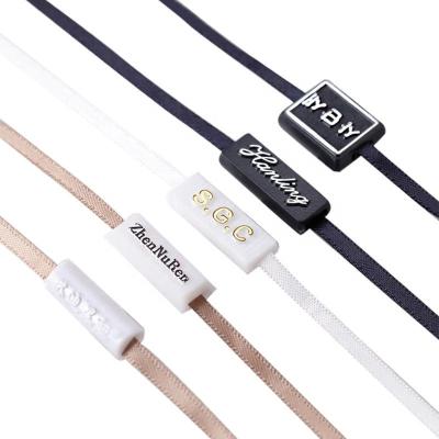 China Custom Line Suspender Lettering Apparel Sustainable Double Suspender Trademark Insert Custom Polyester LOGO Bronzing Plastic Rope Custom for sale