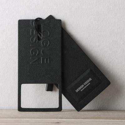 China Sustainable Luxury Wholesale White Cardboard Paper With Debossed Recycled Custom Jeans Hang Tags For Clothing for sale