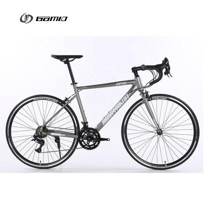 China 14 engranajes de velocidad y centros de rodamiento sellados de liberación rápida GOMID Bicicleta de carretera de fibra de carbono simulada para hombre Bicicleta de carretera personalizada en venta