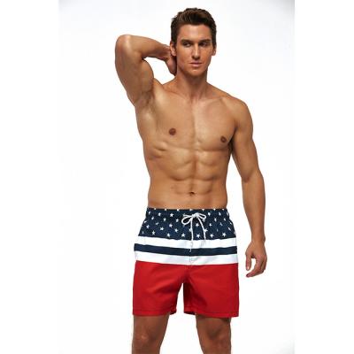 China Anti-Wrinkle Hot Selling American Flag Printing Mens Vacuum Swim Shorts Swimming Trunks Wholesale Low Price Beach Shorts Gym Shorts for sale