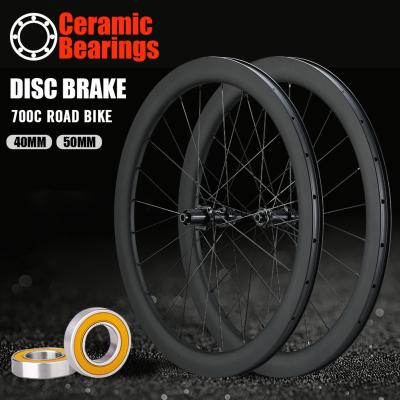 China ROAD BIKE Disc Brake Carbon Wheels 700C Ceramic Bearing Hub Racing Bike Rims V-Brake Rimsets Anvil 38mm Width 50mm Road Bike Wheels for sale