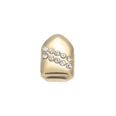 China Single Hiphop Tooth Cover Grillz Hiphop Small Diamond Bonded Gold Plated Dental Teeth Grillz Dientes De Oro Custom Canine for sale