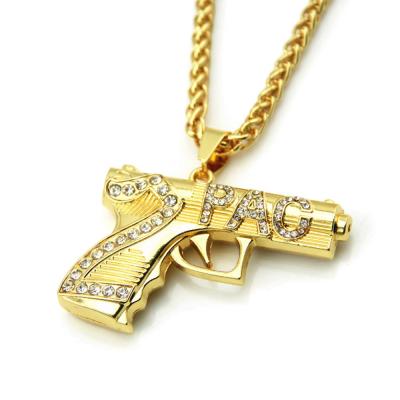 China Hiphop Army Jewelry Mens Rhinestone Gun Pendant Fox Chain Gold Iced Out Long Plated Diamond Pendant Hip Hop Jewelry for sale