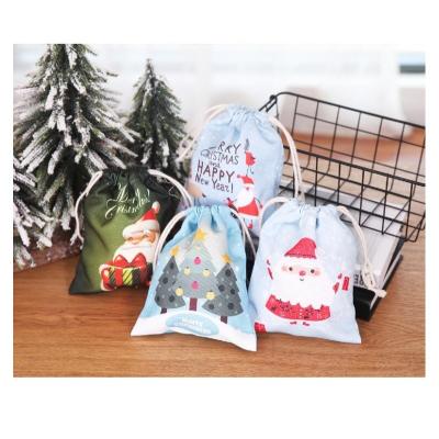 China Cute Christmas Sants Drawstring Candy Bag Christmas Gift Small Handmade Canvas Bag Material Storage Christmas STOCKING202025 for sale