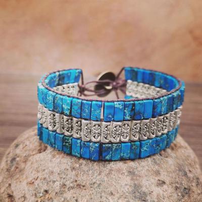 China Vintage Metal Antique Bead Statement Bracelet Jewelry Emperor Blue Stone Weaving Bracelet for sale