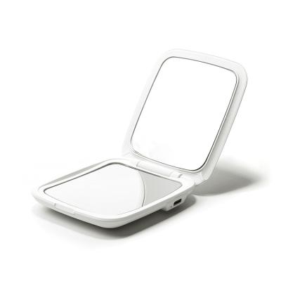 China Portable Lighted Lighted Up Compact Makeup Mirror With Flat Mirror And 5x x5 Magnifying Mirror for sale