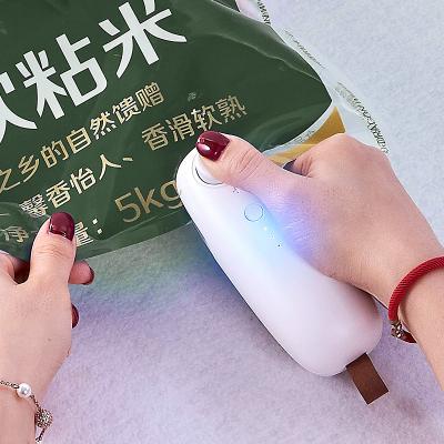 China Portable Portable Filling Cut-Off Two In Plastic Bag Kitchen Food Heat Sealing Mini USB Vacuum Sealer Packaging Machine for sale