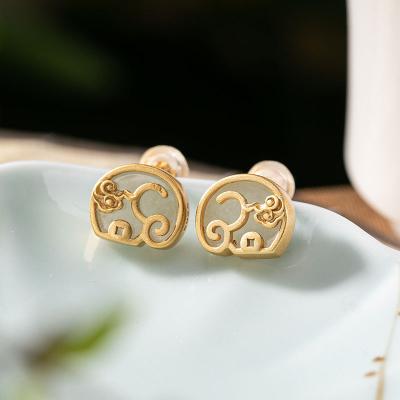 China Vintage Fashion Silver Inlaid Jade Elephant Earring Ornament Retro Natural White Charm Top Brand Women Jewelry for sale