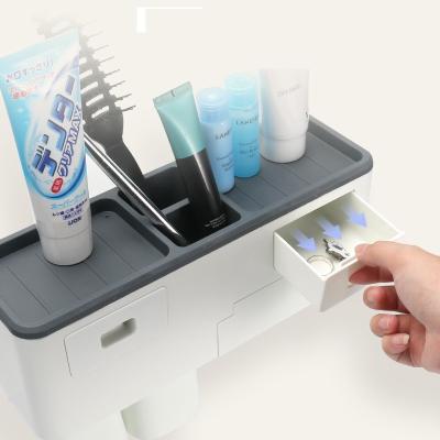 China Sustainable Useful Multifunctional Hotel Toothbrush Holder Portable Wall Mounted Toothbrush Holder for sale