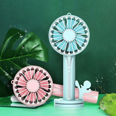 China / Mini Handheld Rechargeable Portable Electric Hand Fan USB Rechargeable Battery Powered Cooling Desktop Fan for sale