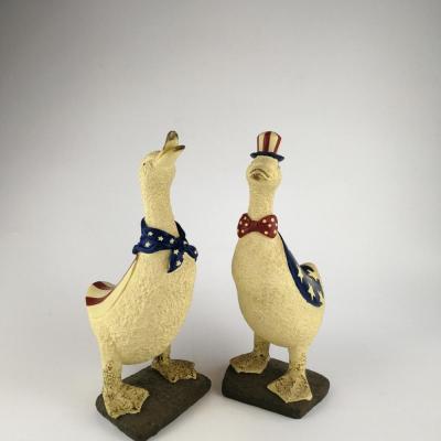 China Ceramic Duck Figurines China America Flag Pattern Bisque Table Home Decoration for sale