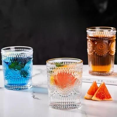 China Sustainable 260ml Engraved Water Juice Embossed Drinking Tumbler Whisky Glass Cup Thick Base Glass Cups for sale