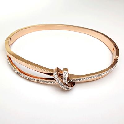 China FASHIONABLE Korean Minimalist Double Ring Cross Bow Stainless Steel Bracelets Women's Zircon Light Fashion Luxury Bracelet for sale