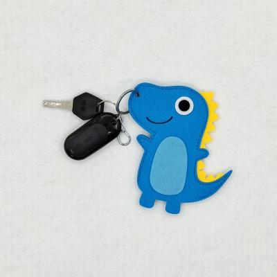 China Hot Selling Skin Natural New Product Cartoon Toy Dinosaur Key Chain Key Chains for sale