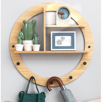 China Modern minimalist bamboo wall shelf home wall decoration bedroom entrance wall shelf for sale