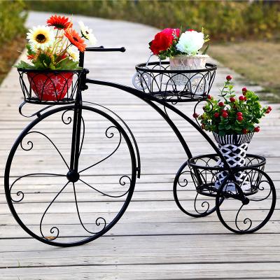 China Creative Indoor Flower Pot Rack Corrosion Resistance Metal Flower Display Plant Stand Floor Wedding Decoration Flower Stand for sale