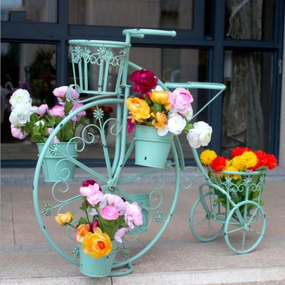 China Corrosion Resistance Creative European Style Bicycle Flower Stand Flower Plant Stand Gardening Planting Flower Pots And Planters for sale