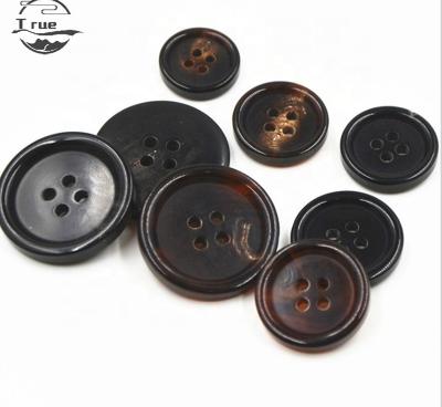 China Customized Round Sell Well New Type Plastic Resin 4 Holes Horn Buttons For Women Clothes for sale