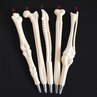 China Promotional Pen Novelty Creative Plastic Ball Pen Promotional Bone Shape Ball for sale