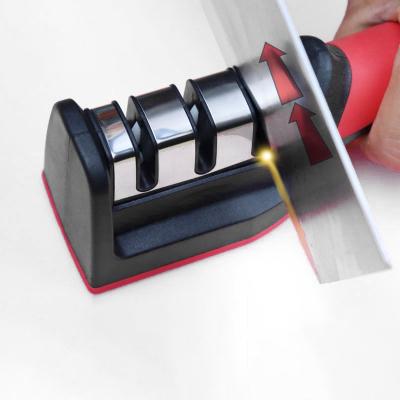 Cina Viable Multifunctional Home Handheld 3 Step Sharpening Tool Kitchen Whetstone Knife Sharpening Machine Professional Knife Sharpener in vendita