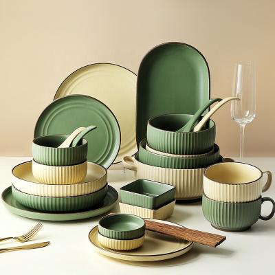 中国 Disposable Modern Housewife Same Style Ceramic Dish and Roll Luxury Nordic Porcelain Dinnerware Set Nordic Ceramic Dinnerware Set 販売のため