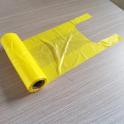 China Eco-friendly Supermarket Transparent Takeaway T-shirt Folding Plastic Bags Shopping Roll for sale