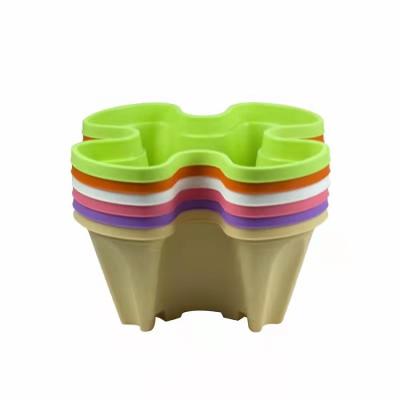 China Modern Plant Sale Garden Planting Stackable Four-petal Planter Flower Pots for sale