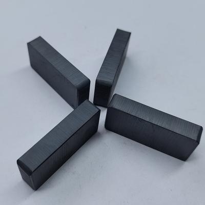 China Moto Magnet Competitive Price Ferrite Arc Magnet Update Version Powerful Arc Ferrite Tile Shaped Magnets Curve for sale