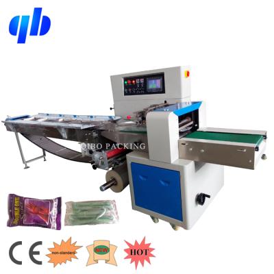 China CLOTHING Automatic Latex Glove Packing Machine Disposable Surgical Gloves Flow Packing Machine for sale