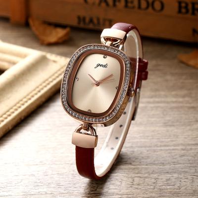 China Retro full personality creative belt GEDI calendar ladies watches Diamond-set oval dial fashion quartz watches for sale