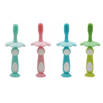 China New Arrival Foldable Food Grade Silicone Toothbrush Kids Cute Flower Baby Soft Toothbrush for sale