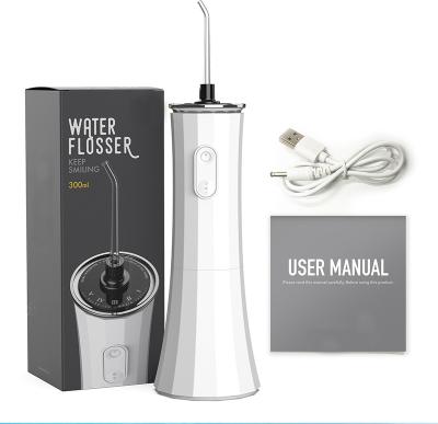 China Portable Dental Cordless Water Flosser Jet Irrigator Dental Teeth Cleaner USB Household Oral Rechargeable Electronic Water Flosser for sale