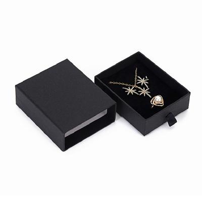 China Jewelry drawing box Custom special paper hot gold jewelry necklace packaging gift box earring packaging box en venta