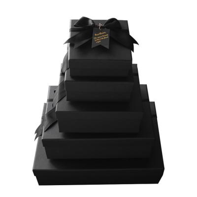 China Custom Black Art paper C1S C2S Rigid Gift Boxes With Ribbon for sale